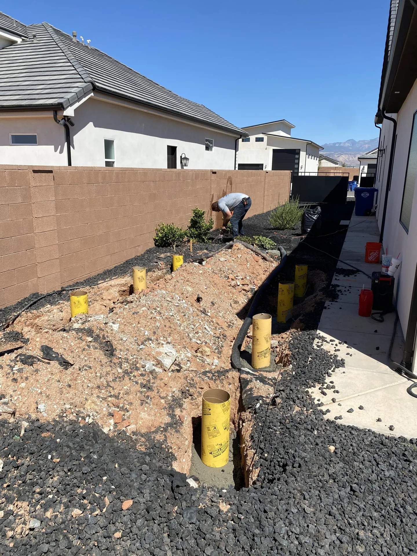 Viking Solutions shed build in St. George — concrete pier forms set in ground before framing begins