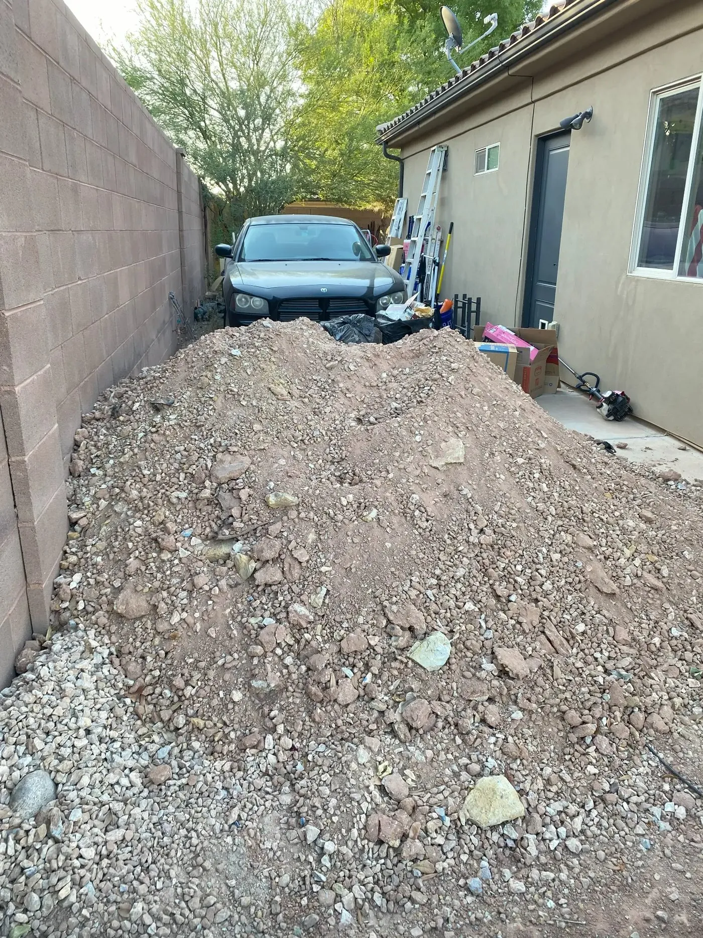 Before: 20,000 pounds of dirt left behind by a previous contractor — Viking Solutions' first major project