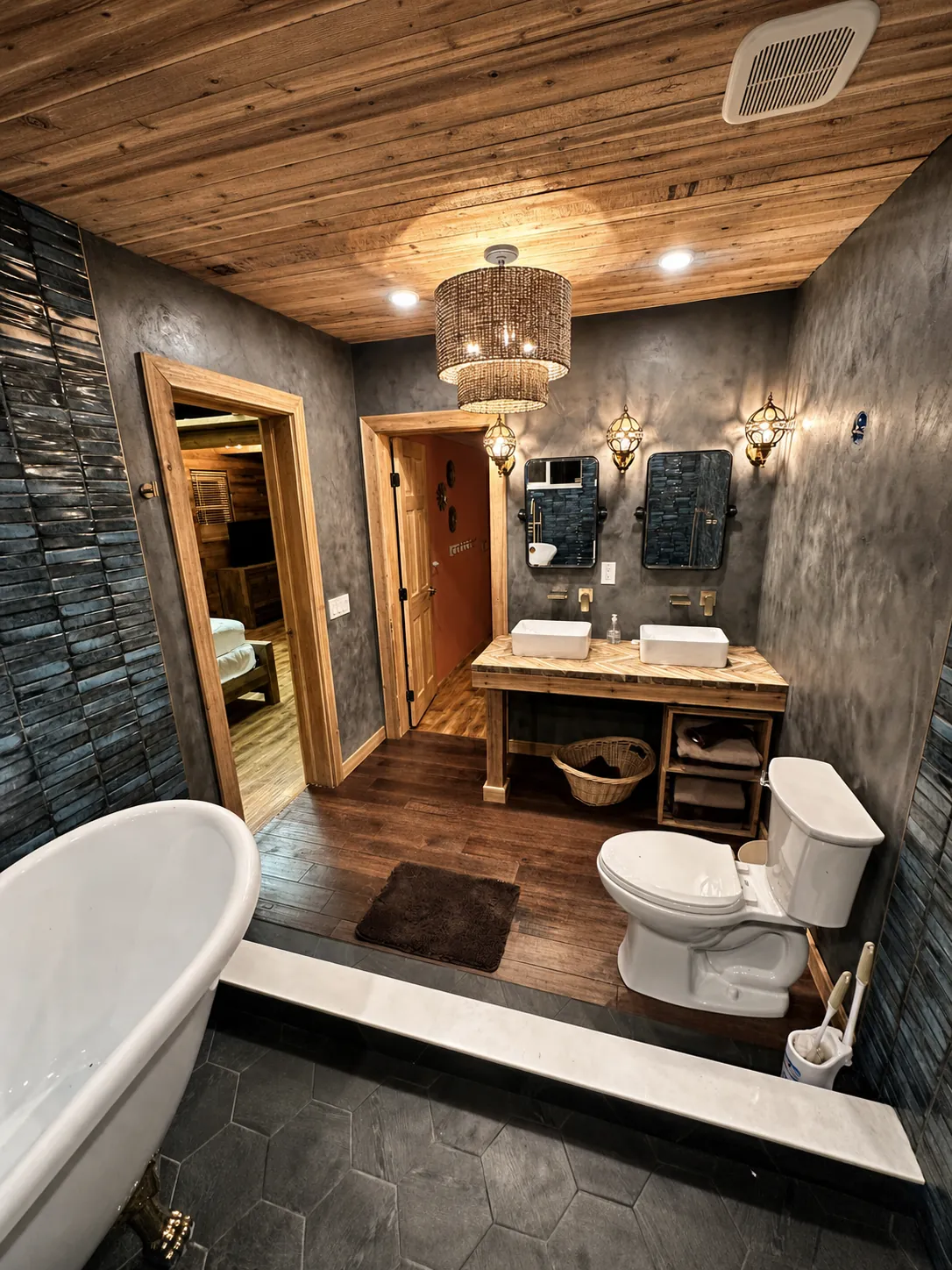 Finished structural bathroom remodel in Washington County, Utah — freestanding clawfoot tub, blue handmade tile, cedar ceiling, and brass fixtures by Viking Solutions