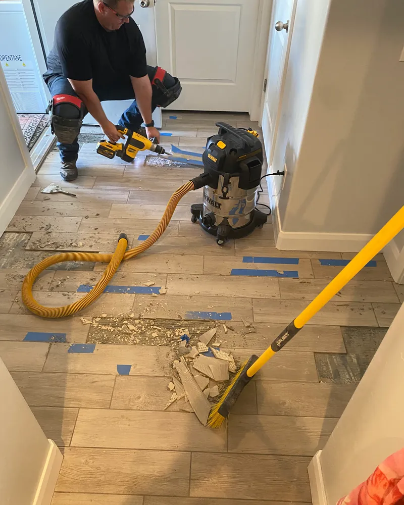 Viking Solutions tile installation — laying tile